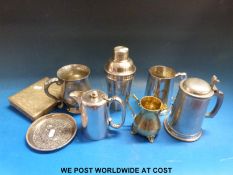 A large collection of plated ware, some boxed, cocktail shaker, mugs, tray, ceramic wine labels,