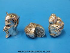 A white metal shell snuff mull together with a Devil vesta and a lion vesta