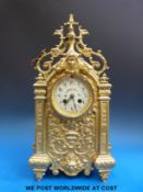 A gilt bronzed cased mantel clock with anonymous French movement striking on a bell,