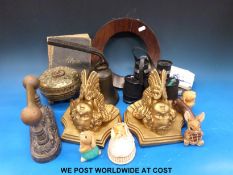A quantity of treen items etc to include a brass hand bell, an embossed brass casket, binoculars,