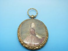 A Victorian/Edwardian pendant set with a painted photograph