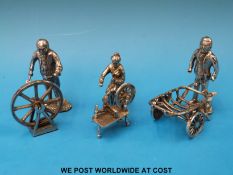 Three Royal Hampshire silver coloured figures comprising spinning lady,