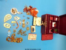 A lapis lazuli and white metal necklace, a translucent amber necklace, coral piece,