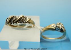 Two 9ct gold rings set with diamonds,