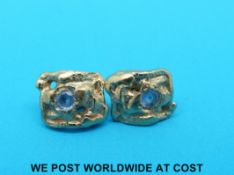 A pair of 9ct gold earrings,