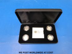 A cased four £1 silver proof piedfort 2011 coin set to celebrate British cities,