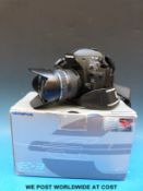 Olympus E-3 digital SLR camera with 14-42 blue ring zoom lens, 4gb SD card, charger, strap, etc,