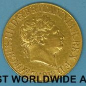 An 1818 George III gold full sovereign in deluxe case with certificate of authenticity from