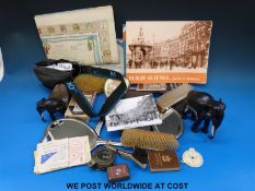 A hallmarked silver brush, comb and mirror set together with an Olympus trip 35,