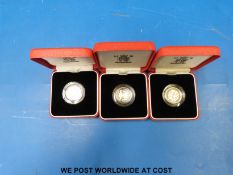 Three cased silver proof £1 piedfort coins 1997,