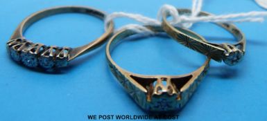 Three 9ct gold rings all set with diamonds