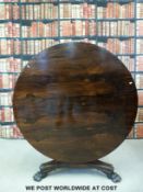 A Regency circular tilt top breakfast table,