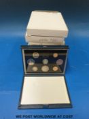 Seven deluxe cased UK coin sets 1983-1989