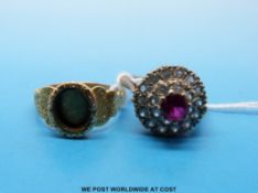A hallmarked 18ct gold ring with chased decoration (1860) together with a 9ct gold ring set with