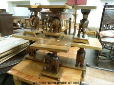 Four small figural elephant side tables and a matching coffee table (tallest 45cm)