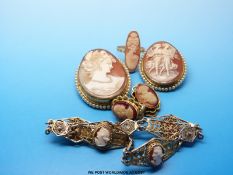 Two cameo brooches, a gilt filigree bracelet set with cameos,