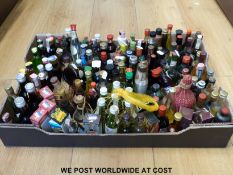 An assortment of approximately 70 alcohol miniature liqueurs,