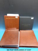 Four albums of GB presentation packs,