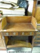 A mahogany two drawer washstand with gallery back and shaped undershelf (H98 x W76 x D40cm)