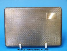 A hallmarked silver cigarette case (197g)