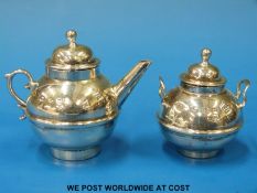 A Victorian hallmarked silver miniature teapot and covered bowl,