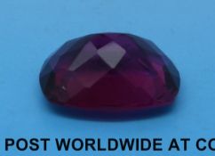 A pink topaz measuring 30.