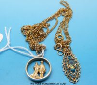 A 9ct gold circular cut out St Christopher pendant and chain together with a 9ct gold pendant set