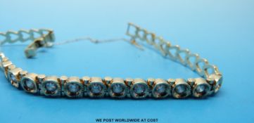 A 14ct gold bracelet set with diamonds