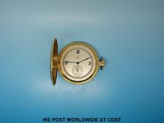 Omega full hunter yellow metal cased pocket watch with engine turned case marked 14k,