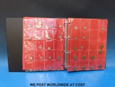 A folder containing an amateur collection of coin in the whole,