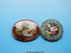 A micro mosaic brooch depicting a landscape with sun stone surround together with another micro