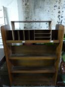 A shopfitting style bookcase or shoe rack with Alexander Rose to ends (H120 x W90 x D35cm)