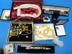 A collection of silver jewellery to include suites set with malachite,moonstone & amethyst,