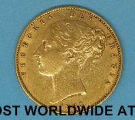 An 1865 young head gold full sovereign, shield back,