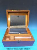 A 19th century walnut writing slope with brass fittings,