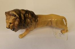 A Beswick Figure : Lion - Facing Left, m