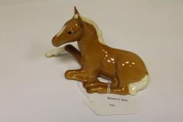 A Beswick Figure : Foal - Lying, model 9
