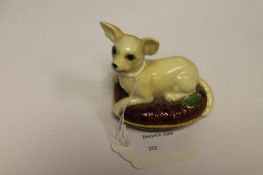 A Beswick Figure : Chihuahua - Lying on