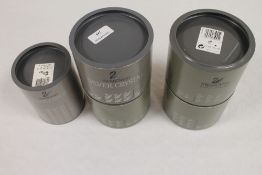 A collection of five Swarovski crystal o