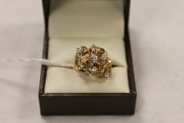 A 14ct gold diamond cluster ring. CONDITION REPORT: Good condition.