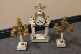 A three piece French white marble and or