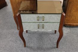 A twentieth century mirrored two drawer
