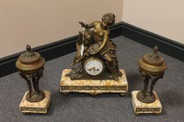A three piece French marble and spelter