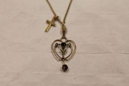 A 9ct gold Edwardian style pendant on chain set with amethysts. CONDITION REPORT: Good condition,