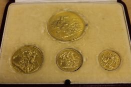 A George VI 1937 gold specimen coin set from £5 to half sovereign, cased.