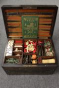 A Victorian coromandel brass mounted games compendium, with fitted interior containing ivory and
