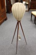 A mid twentieth century teak floor lamp,