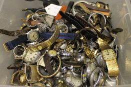 A large quantity of wrist watch movements.