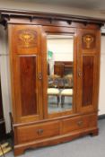A late Victorian inlaid mahogany triple