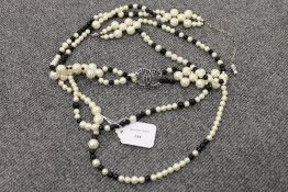 A Chanel two-tone beaded necklace. CONDITION REPORT: Good condition.